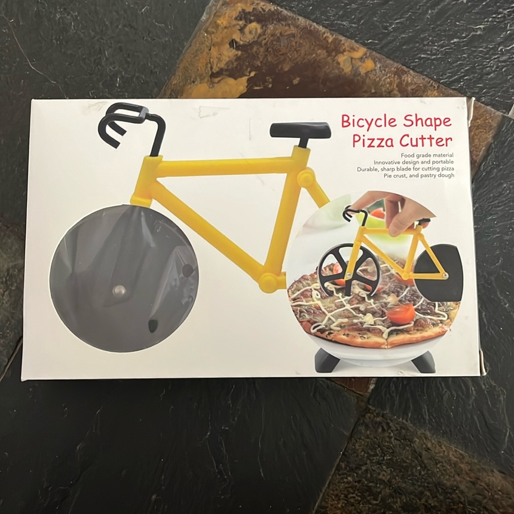 NIB Bicycle pizza cutter and stand.